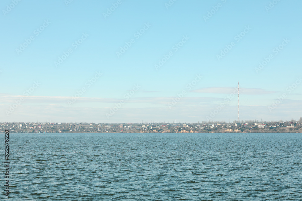 River landscape with blue sky and clouds in the distance