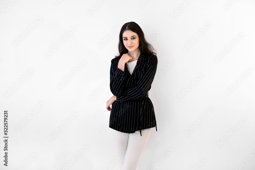Portrait of happy young mixed raced woman in smart casual wear isolated on white background Portrait of happy young mixed raced woman in smart casual wear isolated on white background
