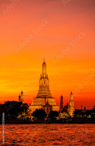 Wat Arun Ratchawararam in the evening sky is a beautiful ancient temple built in the Ayutthaya it is where both domestic and international tourists are popular in Bangkok Thailand