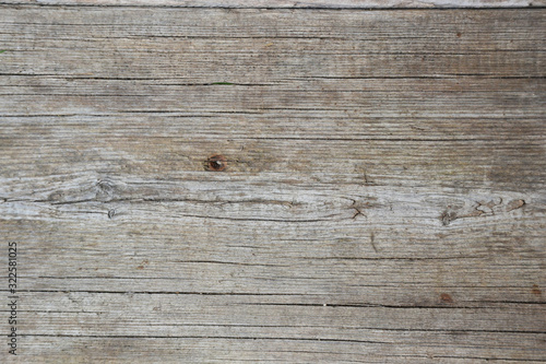 Background of wooden texture. Grey wooden board with cracks