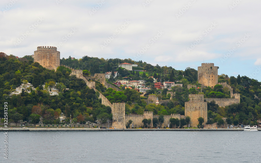 The 15th century Rumeli Hisari fort in the Sariyer district of Istanbul, Turkey. The Halil Pasha Tower defensive flag tower can be seen front right