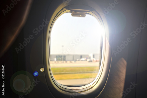 The airplane window is travelling 