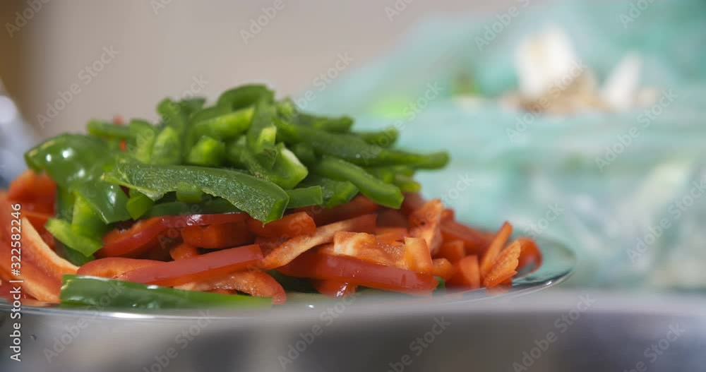 cut green and red peppers in a bowl cut green and red peppers in a bowl