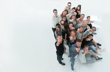 top view. group of happy young people looking at the camera