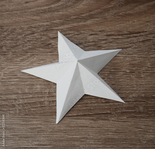 A white origami paper star