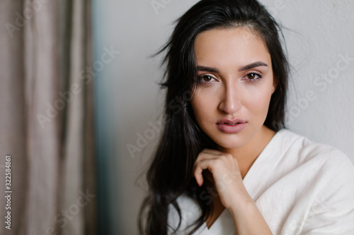 Beautiful caucasian woman is crying. Proud independent sad arab woman. Woe sadness tragedy depression loneliness divorce resentment. Brown eyes with tears. Emotional art portrait. Psychiatrist Anxiety photo
