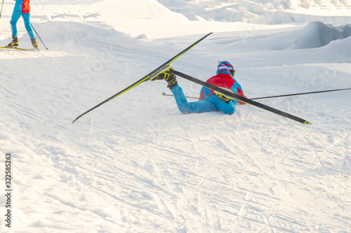 The skier stumbled and fell during the competition.