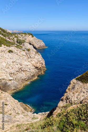 Rocky coast with blue sea. North-east coast of Majorca. Spain