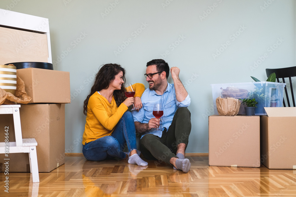 Couple celebrating moving stock photo Couple celebrating moving stock photo