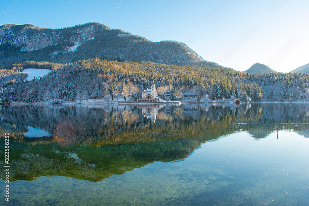 Grundlsee Lake in Austria, Beautiful landscape mountains and trees reflections in water, Austrian Alps in winter 