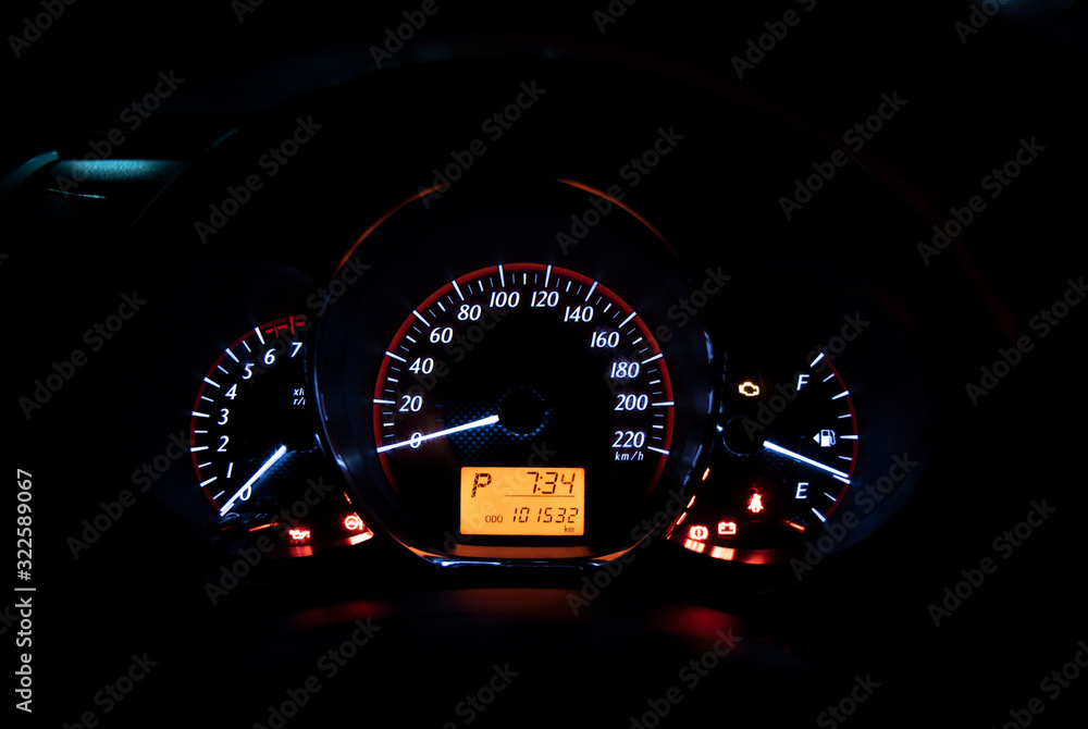 The yellow status display of car speedometer the miles, time and gear is in the car's night watch. Concept Cars Sports