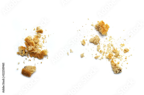 Scattered crumbs of Chocolate chip cookies isolated on white background. Sweet biscuits delicious and crunchy homemade pastry.
