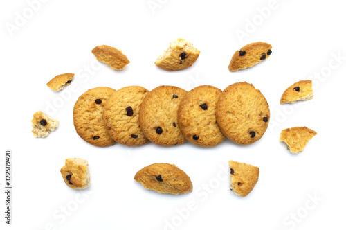 Chocolate chip cookies and broken cracks isolated on white background. Sweet biscuits delicious and crunchy homemade pastry.