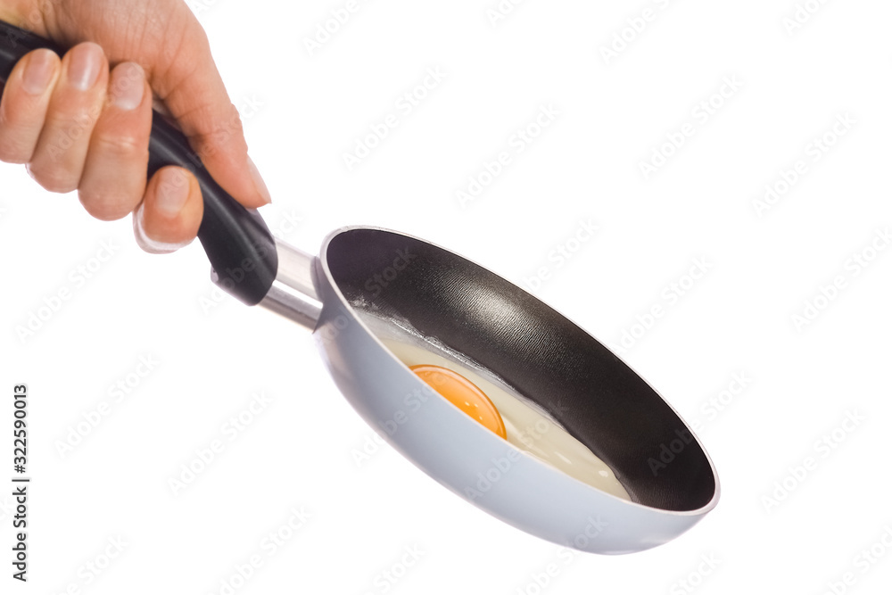 a pan in hands on a white background a pan in hands on a white background