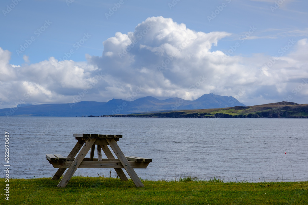 Picnic bench over looking Gruinard Bay Ross and Cromarty Ross-shire HIghland Scotland