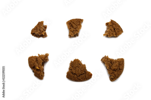 Biscuit with chocolate chip flavored. Some broken and crumbs of crunchy delicious sweet meal and useful cookie with isolated on white background.