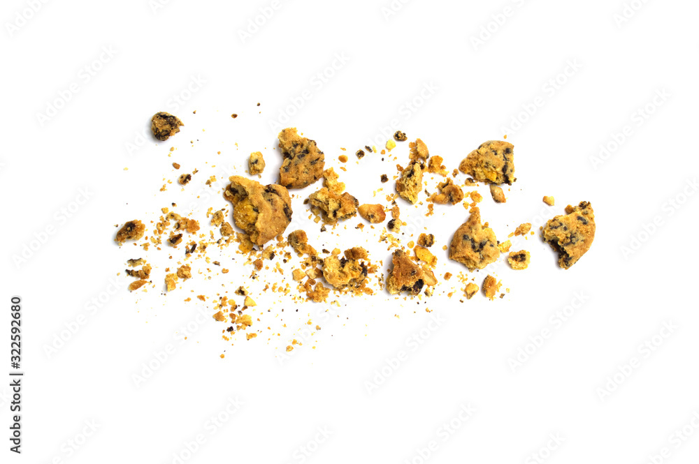 Scattered crumbs of homemade oatmeal raisin cookies isolated on white background. Scattered crumbs of homemade oatmeal raisin cookies isolated on white background.