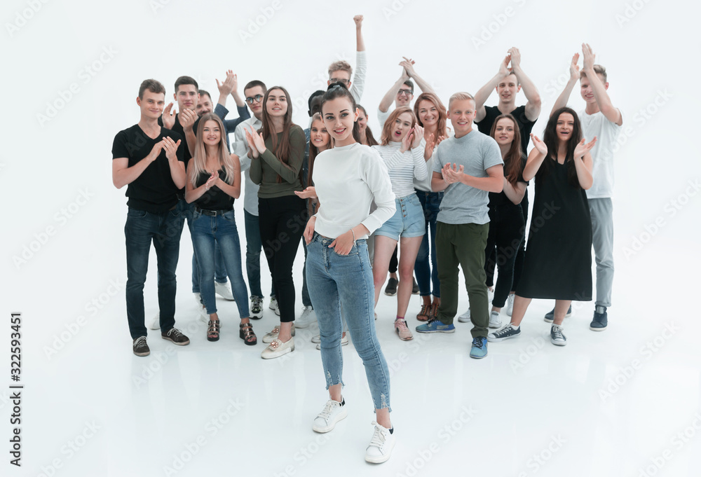 Obraz premium young woman leader standing in front of her friends