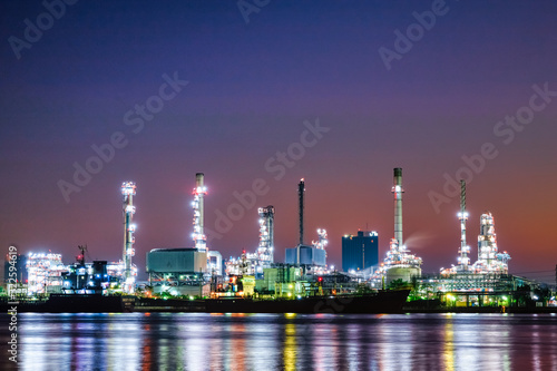 Oil and gas refinery industry plant with glitter lighting and sunrise in the morning, Factory of petroleum industrial, Per plant,Energy power station area. Industry © Shutter B