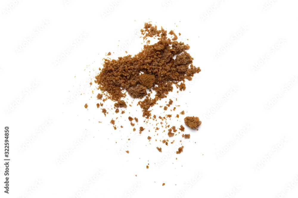 Scattered crumbs of chocolate chip butter cookies on white background. Scattered crumbs of chocolate chip butter cookies on white background.