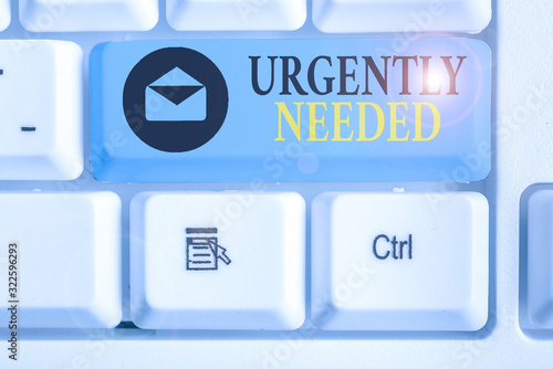 Photography Conceptual hand writing showing Urgently Needed