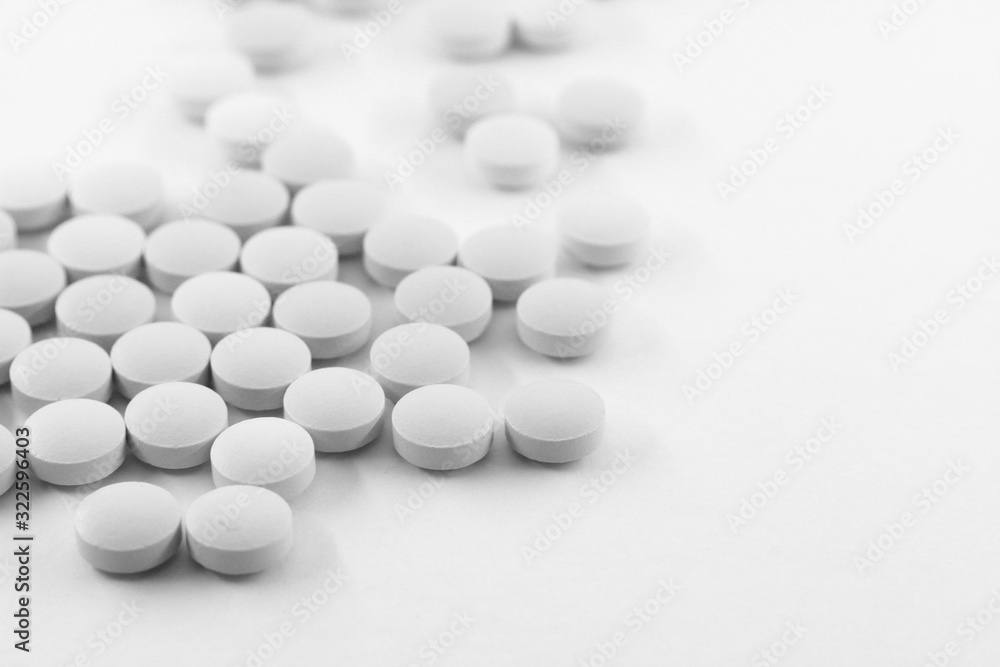 Pill on table, white medical pills Pill on table, white medical pills