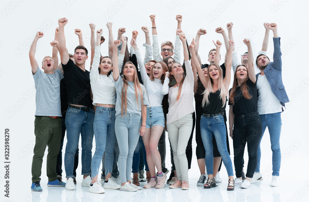 Fototapeta premium happy group of young people with hands up