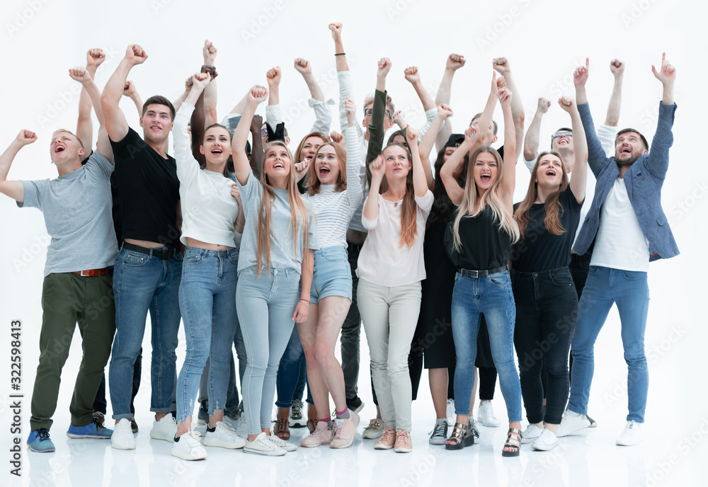 Fototapeta premium happy group of young people with hands up