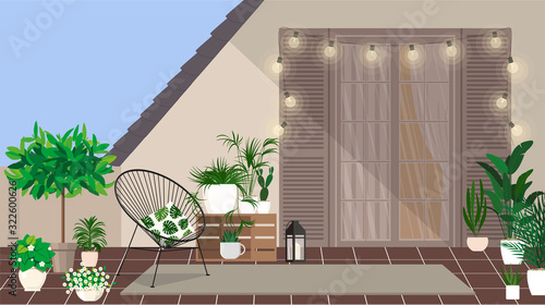 A rooftop balcony with an armchair and a small mini garden.