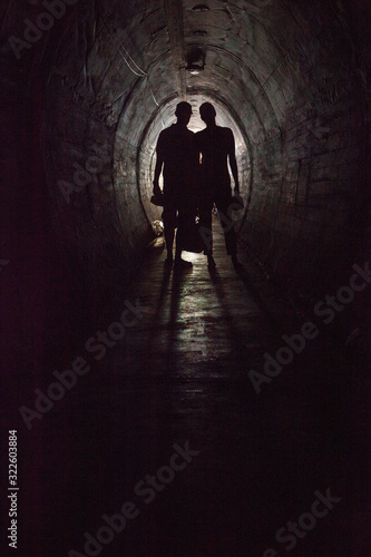 Tunnel of love at Waiheke Island New Zealand. Two persons in tunnel. Bunkers 