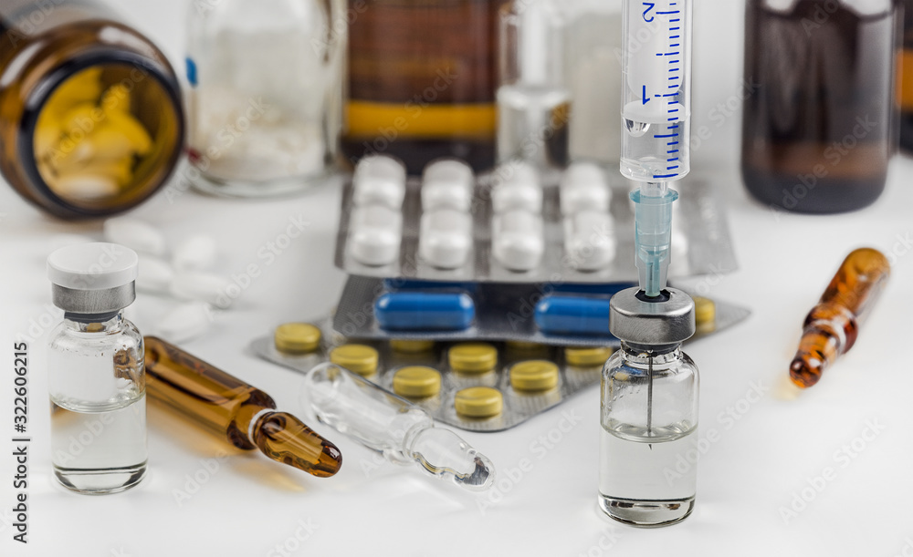 Medicines for treatment. Needle and syringe. Medical concept. Medicines for treatment. Needle and syringe. Medical concept.
