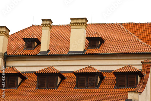 Prague. 05.10.2019: Orange colored roof tops of Prague old town buildings and baroque style houses viewed from top of old town hall tower, Prague, Czech Republic. Panorama. photo