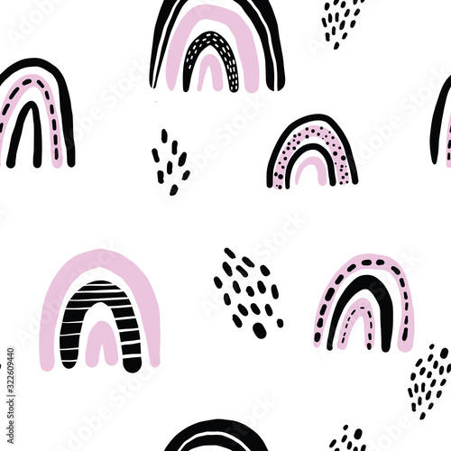 Childish seamless pattern with hand drawn rainbow scribbles and dots. Trendy kids vector background.