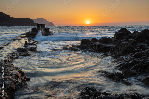 Sunrise on the coast of Isleta del Moro. Natural Park of Cabo de Gata. Spain.