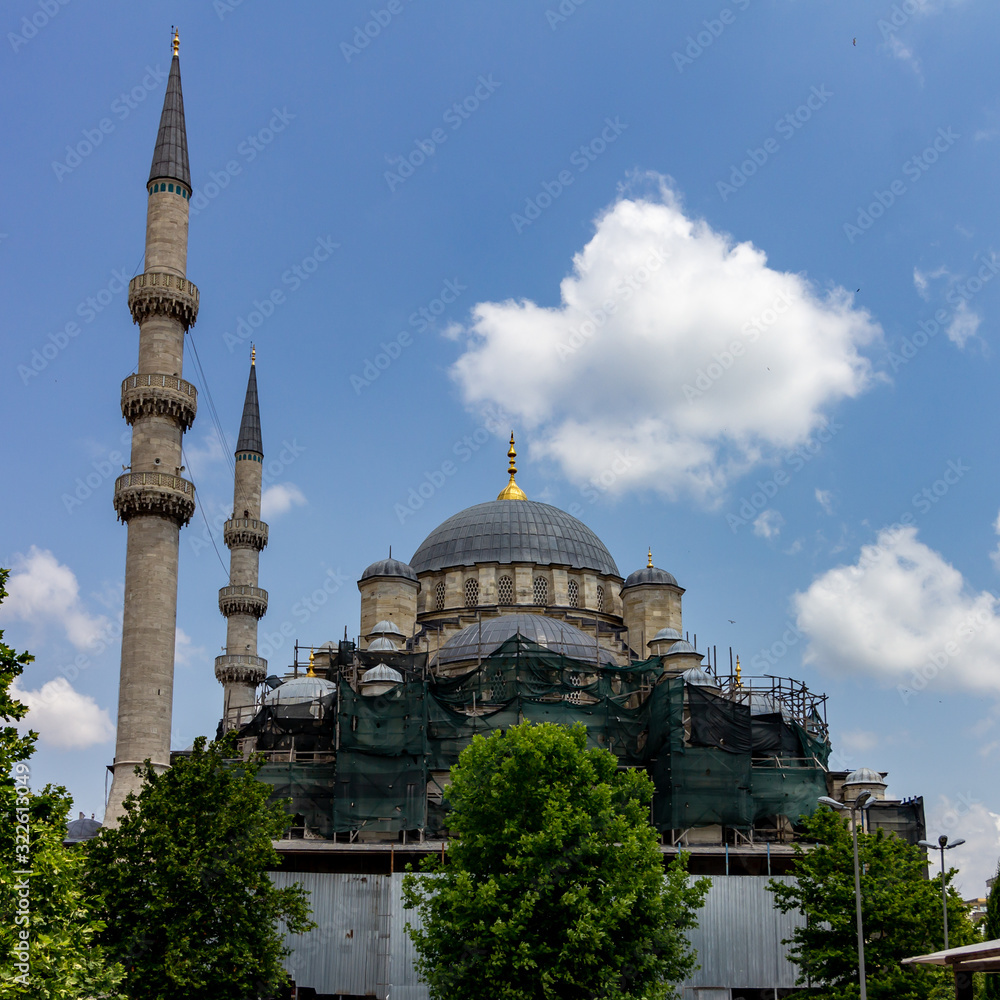 June 18, 2019 - Istanbul, Turkey - Yeni Cami (New Mosque) near the entrance to the Istanbul spice market