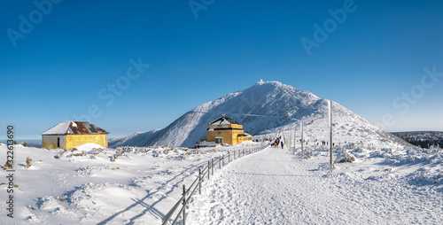 Fototapeta Naklejka Na Ścianę i Meble -  Snezka or Sniezka mountain in winter. View from Kopa mountain in Karkonosze National Park, Sudetes, Poland