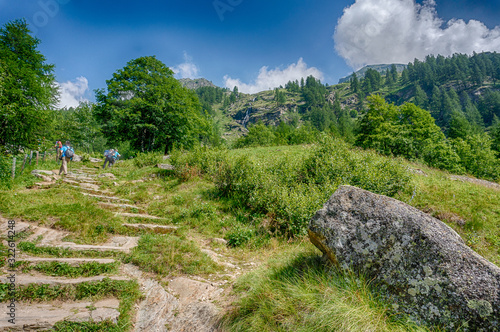 Trekking in Italian Alps mountain photo