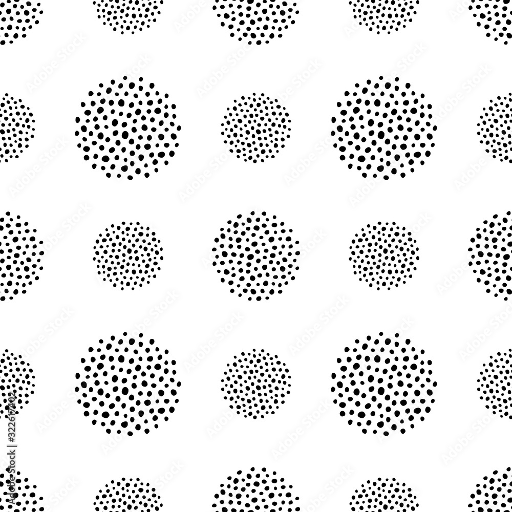 Seamless pattern of black dots in the form of circles on a white background. Geometric abstraction. Vector.