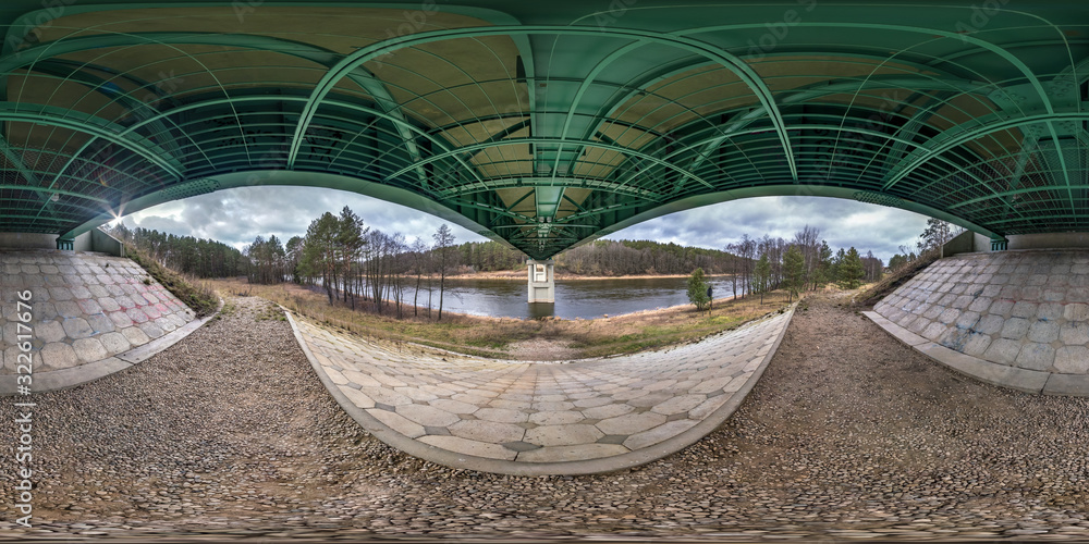 full seamless spherical hdri panorama 360 degrees angle view under steel frame construction of huge bridge across river  in equirectangular projection. VR  AR content