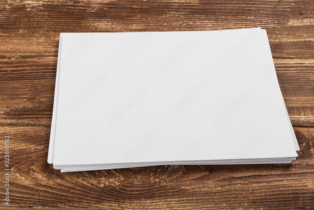 white paper on wood background and shadow white paper on wood background and shadow