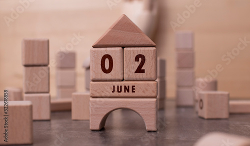 June 2 written with wooden blocks