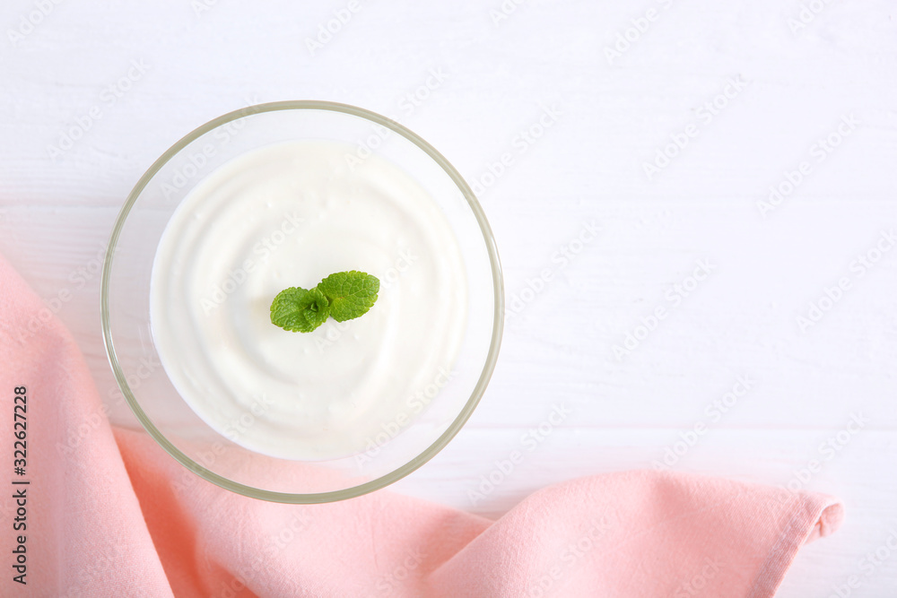 Natural white yogurt on the table. Healthy snack, Greek yogurt. Natural white yogurt on the table. Healthy snack, Greek yogurt.