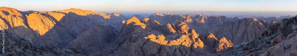 Egypt. Mount Sinai in the morning at sunrise. Bedouin village. (Mount Horeb, Gabal Musa, Moses Mount). Pilgrimage place and famous touristic destination.