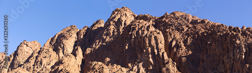 Egypt. Mount Sinai in the morning in the bright sun. (Mount Horeb, Gabal Musa, Moses Mount). Pilgrimage place and famous touristic destination.