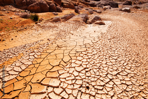 A dried up river bed in the Anti Atlas mountains of Morocco, North Africa. In recent years, rainfall totals have reduced by around 75% as a result of climate change. This has led to many Berb