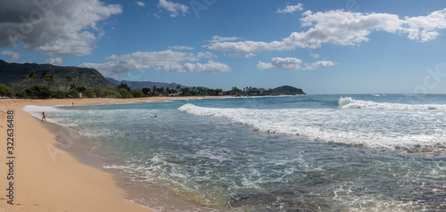Panorama of the bay and sand of Makaha beach park on the extreme west coast of Oahu in Hawaii photo
