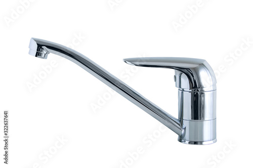 Chrome plated metal faucet. White isolate.