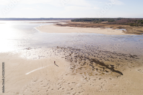 Aerial view of a man walking on sand, Hullo, L‰‰ne County, Estonia photo