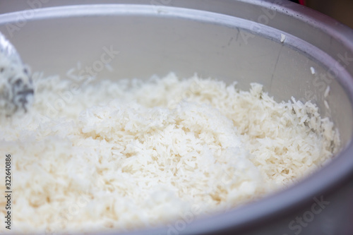 white boiled rice close up. healthy eat and diet concept. Steam cooked rice background. Boiled Basmati rice.