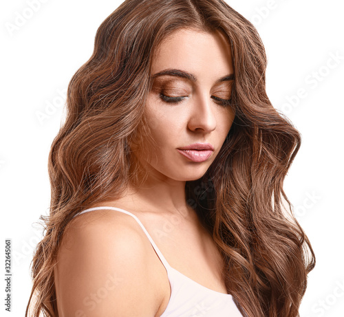 Beautiful woman with curly hair on white background
